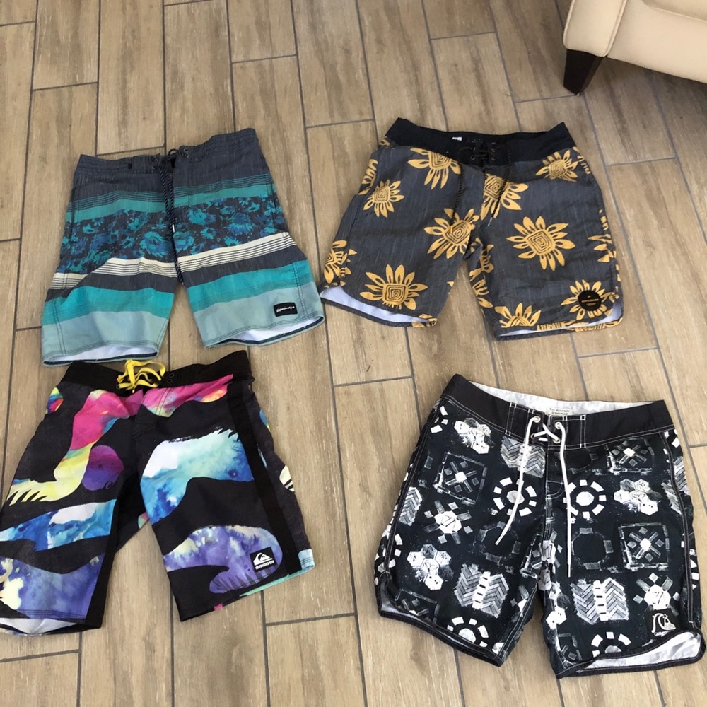 4 pairs of quicksilver board shorts